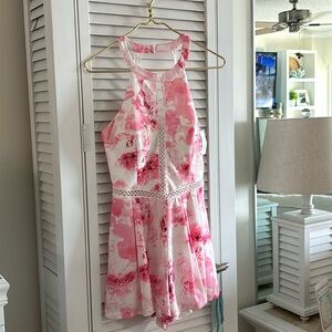 Pink and white floral romper! Never worn tag on.